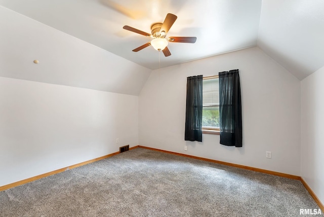 101 N Ridge St, Cambridge, IL 61238 - additional living space featuring carpet flooring, vaulted ceiling, ceiling fan, and baseboards