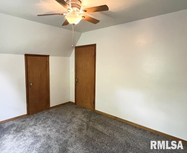 101 N Ridge St, Cambridge, IL 61238 - bonus room featuring dark colored carpet, a ceiling fan, lofted ceiling, and baseboards