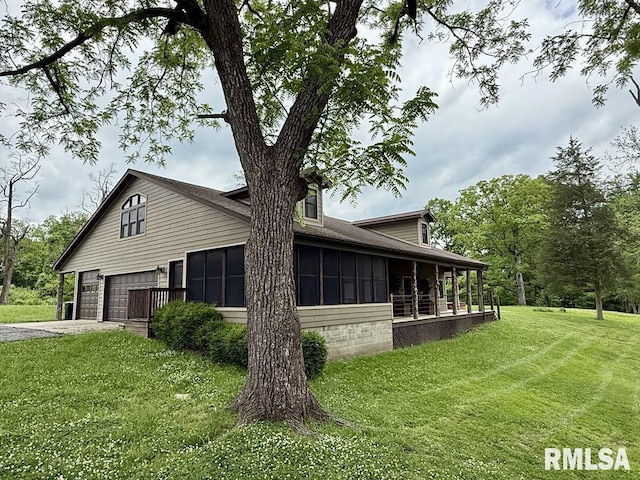 285 Twin Lake, Springs Lake, Anna, IL 62906 - view of property exterior with driveway, a lawn, a garage, a sunroom, and roof with shingles