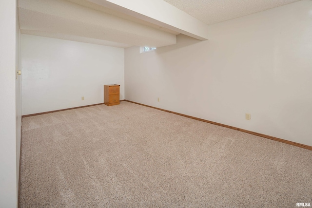 2828 Jersey Ridge Rd, Davenport, IA 52803 - finished below grade area featuring light carpet and baseboards