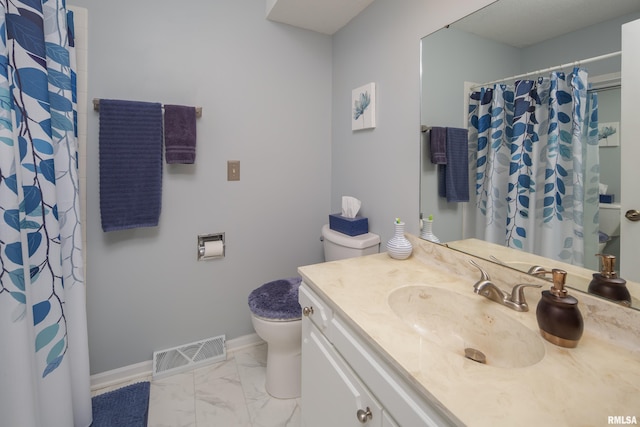 2828 Jersey Ridge Rd, Davenport, IA 52803 - full bath with marble look tiles, toilet, baseboards, vanity, and a shower with shower curtain