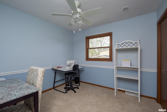 2828 Jersey Ridge Rd, Davenport, IA 52803 - carpeted office space featuring ceiling fan, baseboards, and a textured ceiling