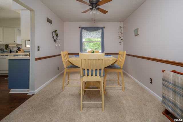 2828 Jersey Ridge Rd, Davenport, IA 52803 - dining space with ceiling fan and baseboards