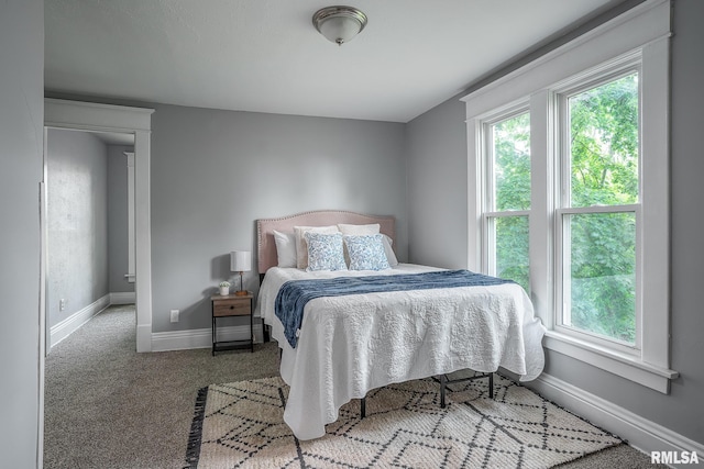534 Lincoln Ct, Davenport, IA 52804 - carpeted bedroom with baseboards