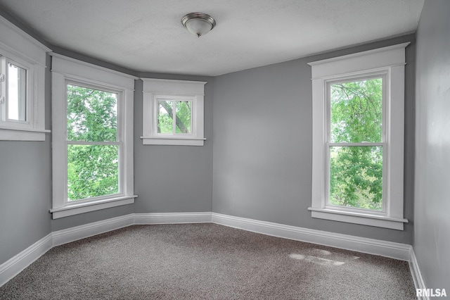 534 Lincoln Ct, Davenport, IA 52804 - carpeted empty room with baseboards