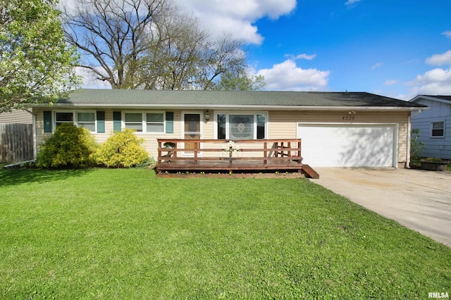 single story home with an attached garage, driveway, and a wooden deck