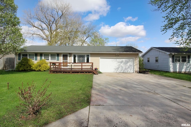 ranch-style house with a garage, driveway, a front lawn, and a wooden deck