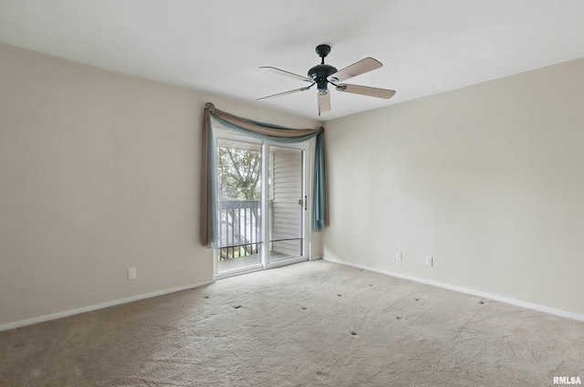 unfurnished room featuring carpet flooring, ceiling fan, and baseboards