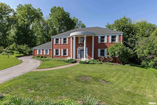 1220 38th Avenue Ct, Rock Island, IL 61201 - neoclassical home with brick siding and a front yard