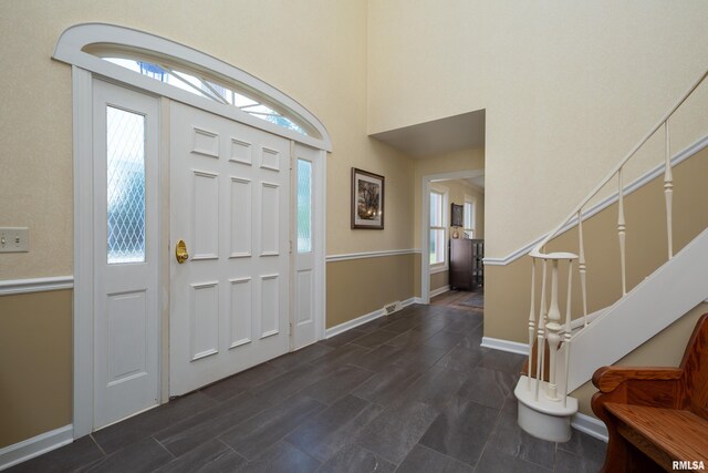 1220 38th Avenue Ct, Rock Island, IL 61201 - entryway with stairs and baseboards