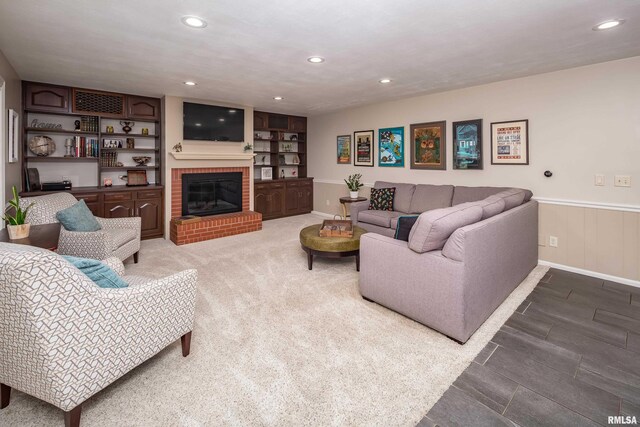 1220 38th Avenue Ct, Rock Island, IL 61201 - living room with recessed lighting, a brick fireplace, baseboards, and wainscoting
