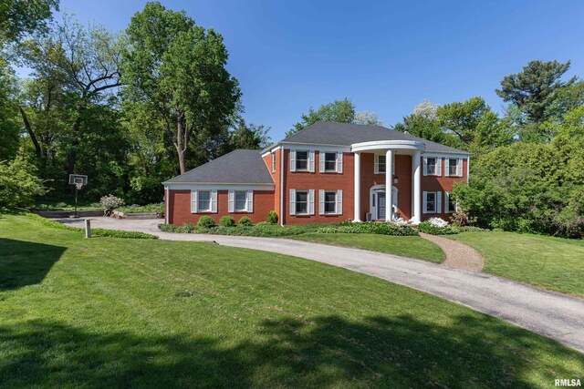 1220 38th Avenue Ct, Rock Island, IL 61201 - greek revival inspired property featuring a front lawn and brick siding