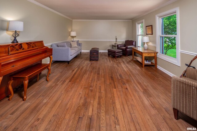 1220 38th Avenue Ct, Rock Island, IL 61201 - living area featuring wood-type flooring, crown molding, and baseboards