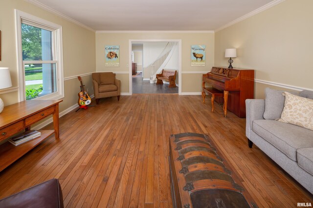 1220 38th Avenue Ct, Rock Island, IL 61201 - living area featuring wood-type flooring, ornamental molding, stairway, and baseboards