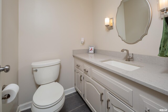 1220 38th Avenue Ct, Rock Island, IL 61201 - bathroom featuring toilet, vanity, tile patterned floors, and baseboards