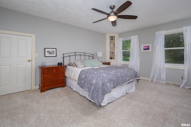 1220 38th Avenue Ct, Rock Island, IL 61201 - bedroom with carpet, a ceiling fan, and baseboards