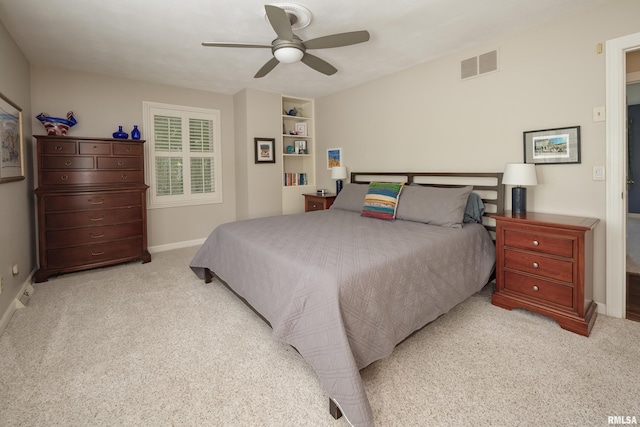 1220 38th Avenue Ct, Rock Island, IL 61201 - carpeted bedroom with baseboards and ceiling fan