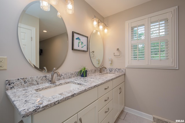 1220 38th Avenue Ct, Rock Island, IL 61201 - full bath featuring tile patterned flooring, double vanity, and baseboards