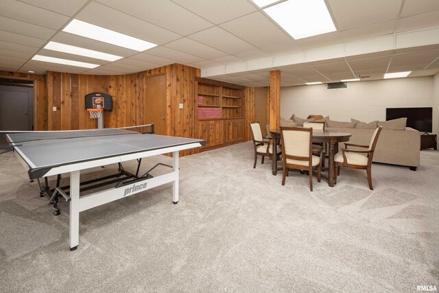 1220 38th Avenue Ct, Rock Island, IL 61201 - playroom featuring carpet flooring, wood walls, and a paneled ceiling