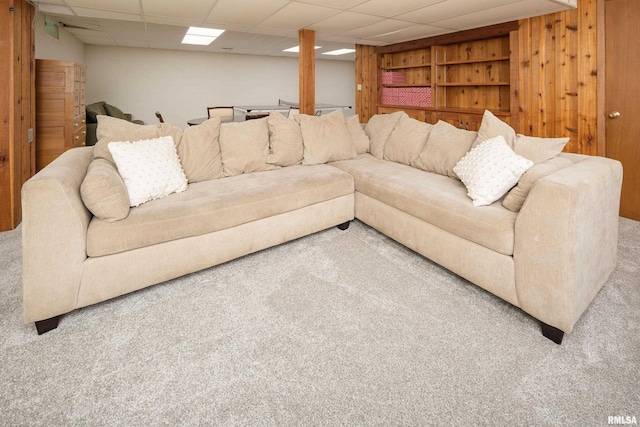 1220 38th Avenue Ct, Rock Island, IL 61201 - carpeted living area with a drop ceiling and wooden walls