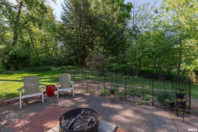 1220 38th Avenue Ct, Rock Island, IL 61201 - view of patio featuring a fire pit