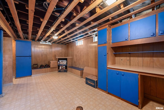 2544 E St, Davenport, IA 52803 - basement with tile patterned floors and wood walls