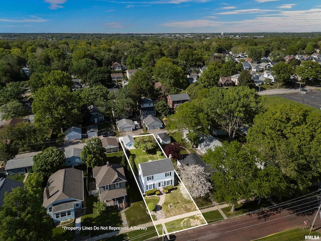 2544 E St, Davenport, IA 52803 - aerial view of property's location featuring property parcel outlined, nearby suburban area, and a forest