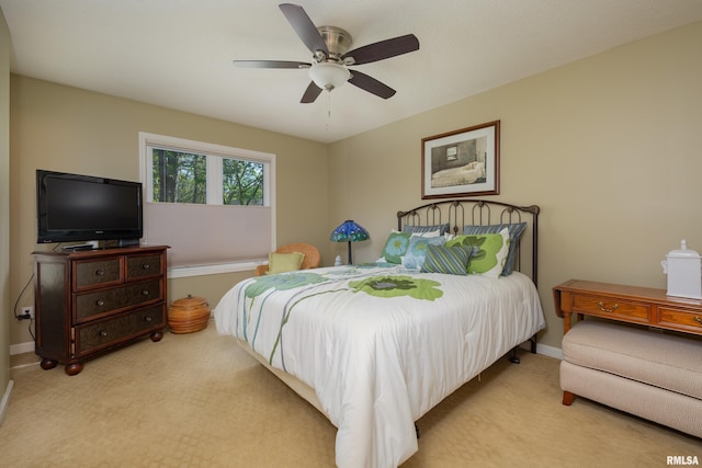 bedroom with carpet, ceiling fan, and baseboards