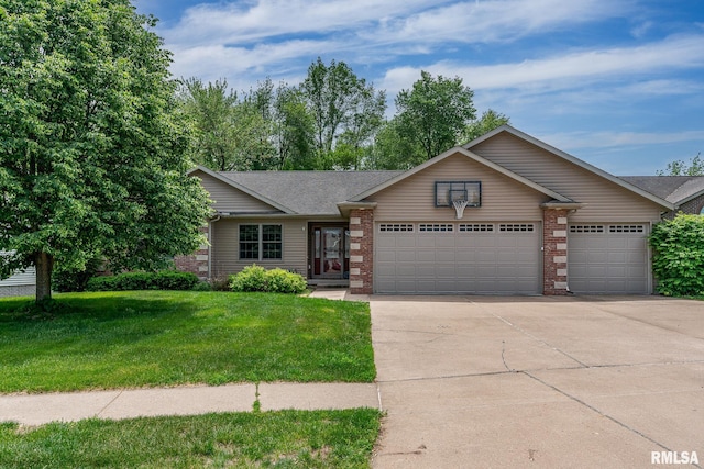 1004 Wild W Dr, Le Claire, IA 52753 - ranch-style house with a garage, driveway, a front lawn, and brick siding