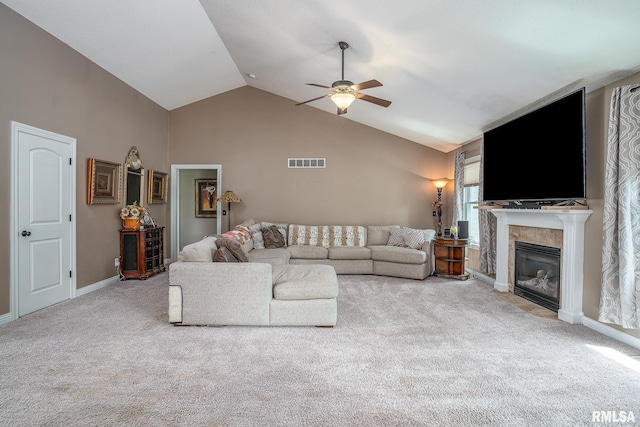 1004 Wild W Dr, Le Claire, IA 52753 - living area featuring carpet floors, ceiling fan, high vaulted ceiling, and a tile fireplace