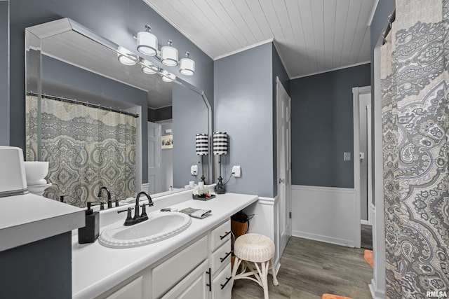 2512 W 45th St, Davenport, IA 52806 - full bathroom featuring crown molding, wood finished floors, vanity, and wood ceiling