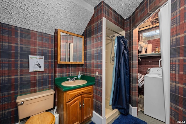 2512 W 45th St, Davenport, IA 52806 - full bath with washer / clothes dryer, a textured ceiling, a shower stall, vanity, and wallpapered walls