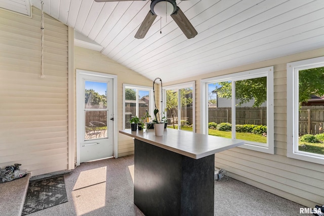 2115 W 31st St, Davenport, IA 52804 - unfurnished sunroom featuring vaulted ceiling, healthy amount of natural light, and ceiling fan