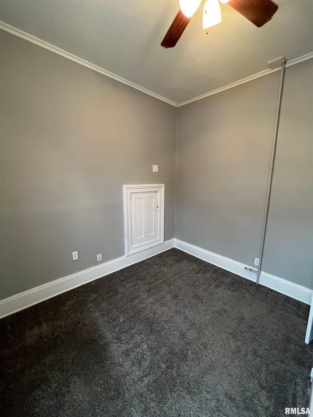 724 W 8th St, Davenport, IA 52804 - spare room with a ceiling fan, crown molding, dark carpet, and baseboards