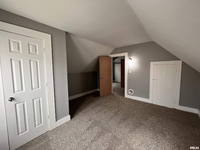1627 W 4th St, Davenport, IA 52802 - bonus room with carpet, vaulted ceiling, and baseboards