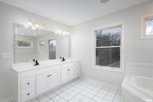 6800 Ridges Ct, Bettendorf, IA 52722 - bathroom with a garden tub, double vanity, tile patterned flooring, and baseboards