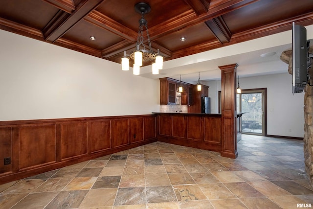 6800 Ridges Ct, Bettendorf, IA 52722 - kitchen featuring coffered ceiling, stone tile flooring, glass insert cabinets, beamed ceiling, and hanging light fixtures