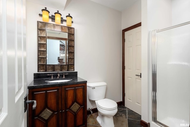 6800 Ridges Ct, Bettendorf, IA 52722 - full bath with a stall shower, toilet, baseboards, and vanity