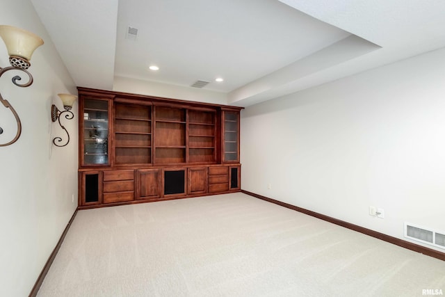 6800 Ridges Ct, Bettendorf, IA 52722 - unfurnished living room with baseboards, recessed lighting, and light carpet