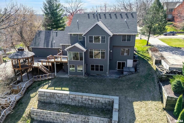 6800 Ridges Ct, Bettendorf, IA 52722 - back of property featuring a deck, a gazebo, stairs, and a patio area