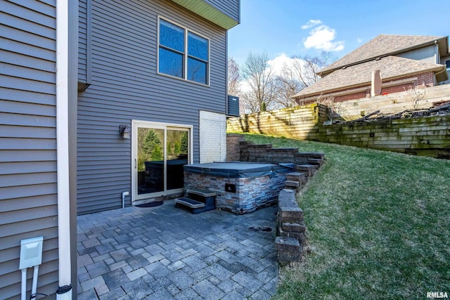 6800 Ridges Ct, Bettendorf, IA 52722 - view of patio / terrace with a hot tub and fence