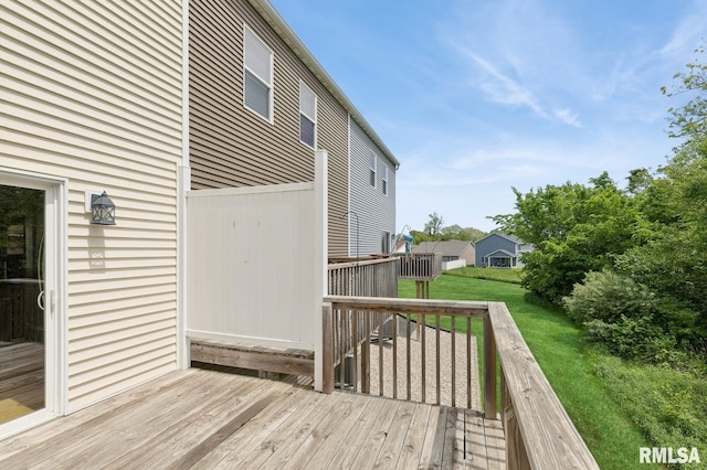 725 Cox Ct, Le Claire, IA 52753 - wooden deck with a lawn