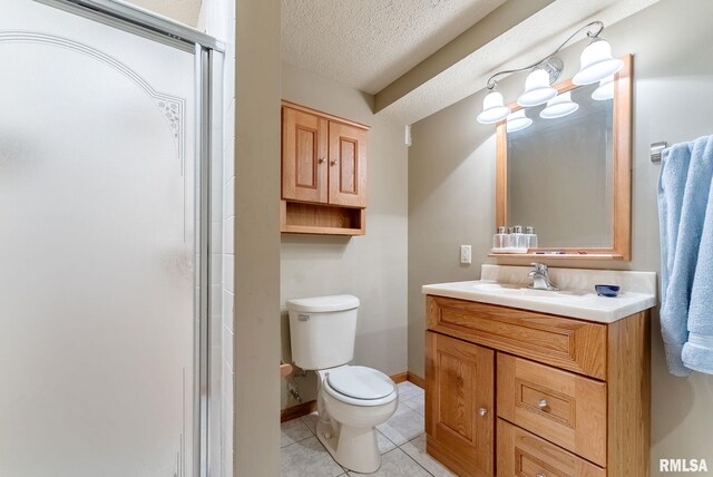 5812 N Thornwood Ave, Davenport, IA 52806 - full bath with tile patterned flooring, toilet, vanity, a textured ceiling, and a stall shower