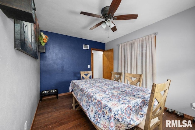 3430 W Locust St, Davenport, IA 52804 - bedroom featuring wood finished floors, baseboards, and a ceiling fan