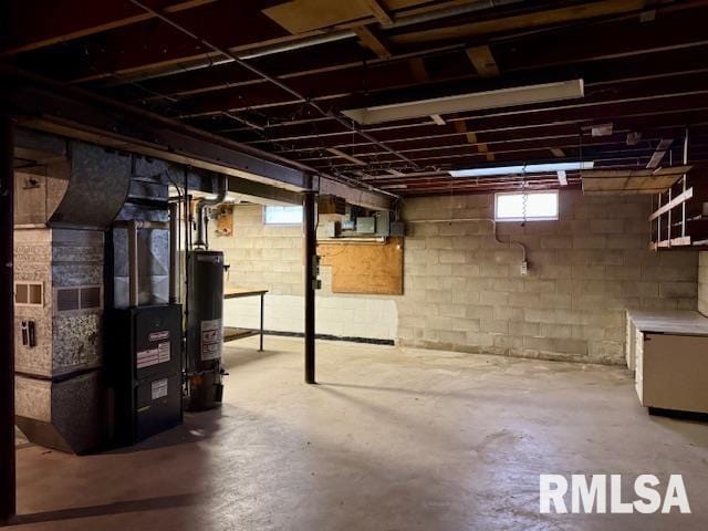 1003 16th Ave N, Clinton, IA 52732 - basement with water heater and heating unit