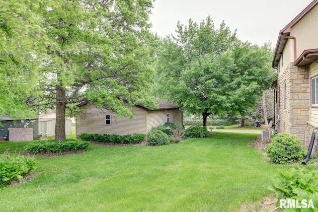 1845 S Bluff Blvd, Clinton, IA 52732 - view of green lawn with central AC unit