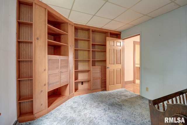 1845 S Bluff Blvd, Clinton, IA 52732 - unfurnished bedroom featuring carpet floors and a drop ceiling