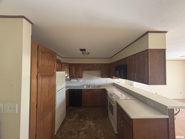 920 17th St Unit 28, Moline, IL 61265 - kitchen featuring black appliances, light countertops, a sink, a textured ceiling, and decorative backsplash