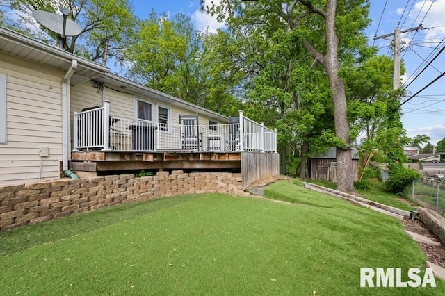 view of yard with a wooden deck