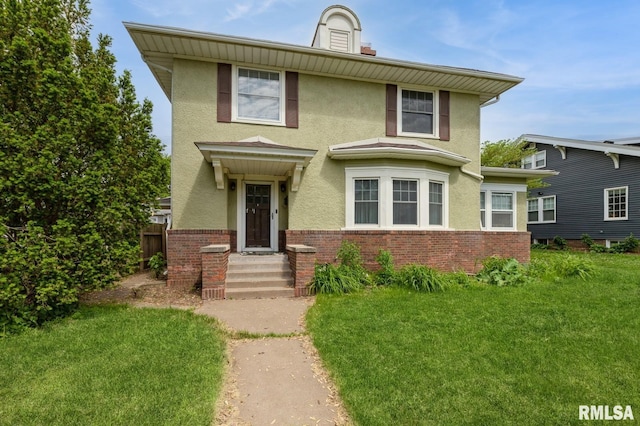 2505 Iowa St, Davenport, IA 52803 - view of front facade featuring stucco siding and brick siding